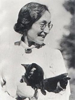 Doctor Rose Scheur - Karpin holding German Rex Kittens